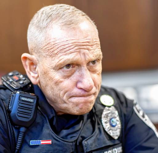 Pittsfield police officer Don Bolduc at the the station before going on patrol. Bolduc, at 61, has started at the bottom of the ranks.