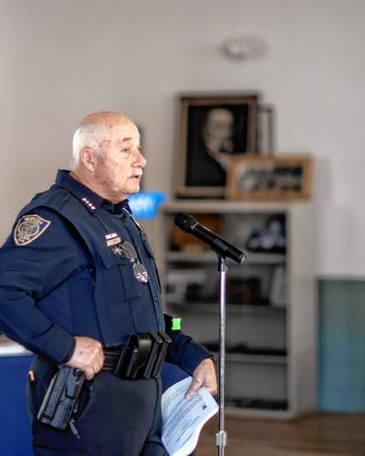 Webster police chief Stephen Adams talks to the residents about the need for a new police cruiser at the town meeting on Saturday, March 16, 2024.