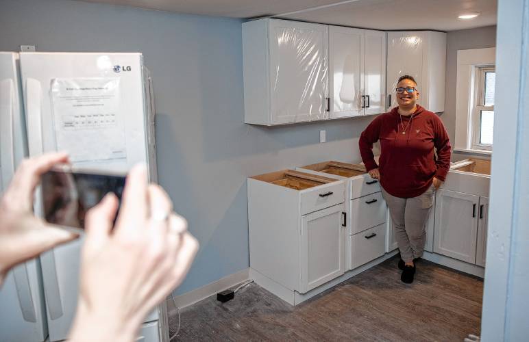 Glenda Leon, director of emergency housing at the Friends Program, poses for a photo in the new kitchen on the second floor during a tour of the remodel of the Thompson Street facility for families on Wednesday, May 8, 2024. The kitchen will have three refrigerators as they took down a wall to expand the area.