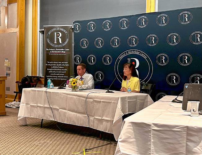 Bill Hamlen (left) and Lily Tang Williams made their case to prospective voters at a Dartmouth College forum Monday.