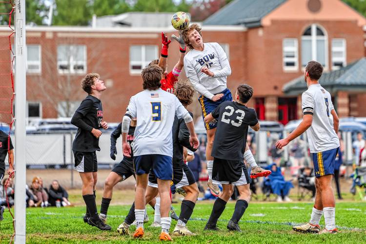 Bow’s Jake Reardon (15) attempts to put a header on goal against Campbell on Saturday in a Division II boys’ soccer quarterfinal match in Litchfield. The No. 9 Falcons fell to No. 1 Campbell, 3-2.