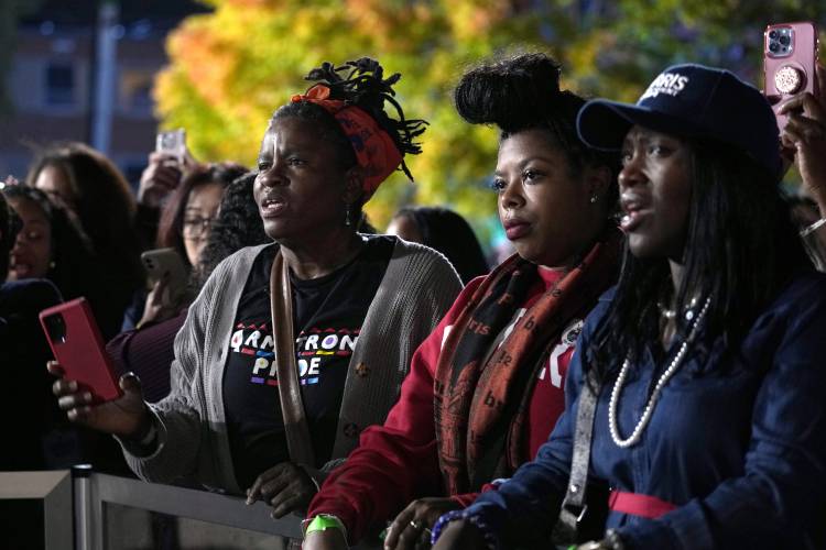 The audience listens as Cedric Richmond speaks during an election night campaign watch party for Democratic presidential nominee Vice President Kamala Harris, Wednesday, Nov. 6, 2024, on the campus of Howard University in Washington. (AP Photo/Susan Walsh)