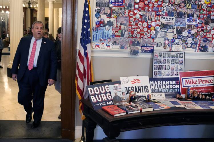 Republican presidential candidate and former New Jersey Gov. Chris Christie stops by the visitor's center at the State House, Thursday, Oct. 19, 2023, in Concord, N.H. (AP Photo/Charles Krupa)