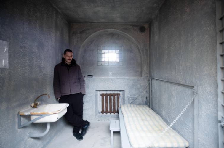 Oleg Navalny, the brother of Alexei Navalny, poses for media in Berlin, Germany, on Jan. 24, 2023, inside a replica of a punishment cell where the Russian opposition leader spent time in 2022.