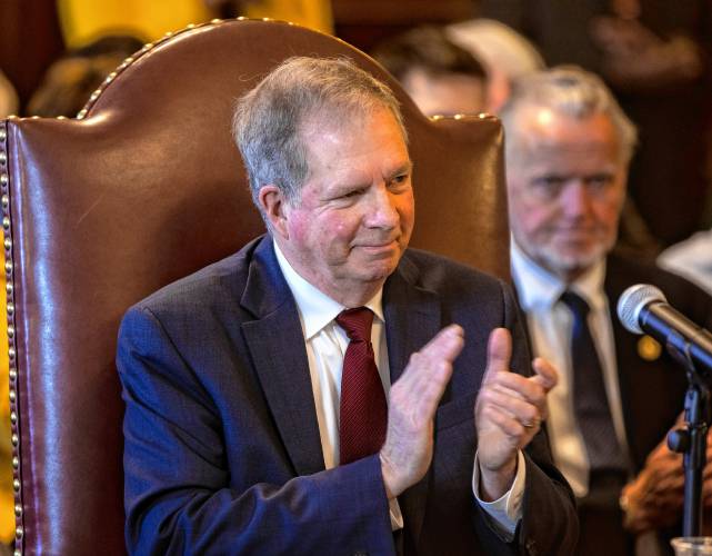 Secretary of State David Scanlan leads the applause after the four electors cast ballots on behalf of Vice President Kamala Harris and Minnesota Gov. Tim Walz, the Democratic vice presidential nominee, in a ceremonial vote at the Executive Council chamber on Tuesday, December 17, 2024.