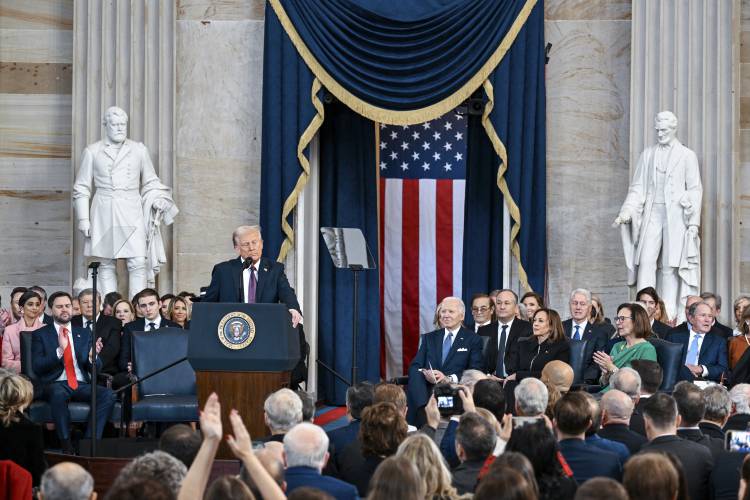President Donald Trump speaks after taking the oath of office during the 60th Presidential Inauguration in the Rotunda of the U.S. Capitol in Washington on Monday.
