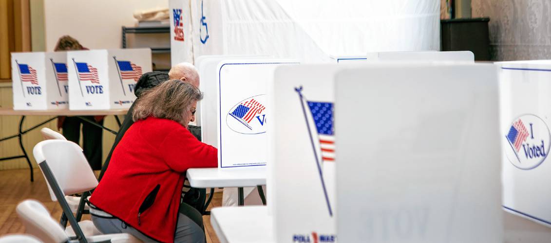 Gail Henry votes inside the Salisbury Town Hall on Tuesday, March 11, 2025.