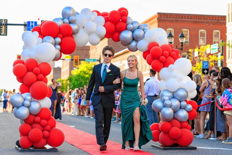 The future’s so bright you got to wear shades. Ashton Lyon and Madison Mayo arrive at the prom. 