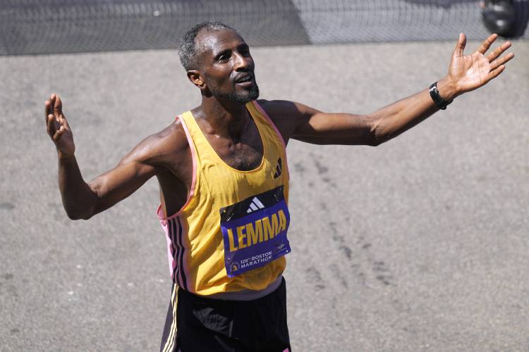 Sisay Lemma, of Ethiopia, reacts after winning the Boston Marathon, Monday, April 15, 2024, in Boston. (AP Photo/Charles Krupa)