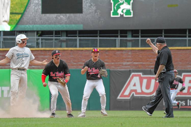 Belmont shortstop Wyatt Divers (left) and second baseman Owen Waldron (4) celebrate after Monadnock’s Ben Dean was caught stealing during the Division III championship game on Saturday.