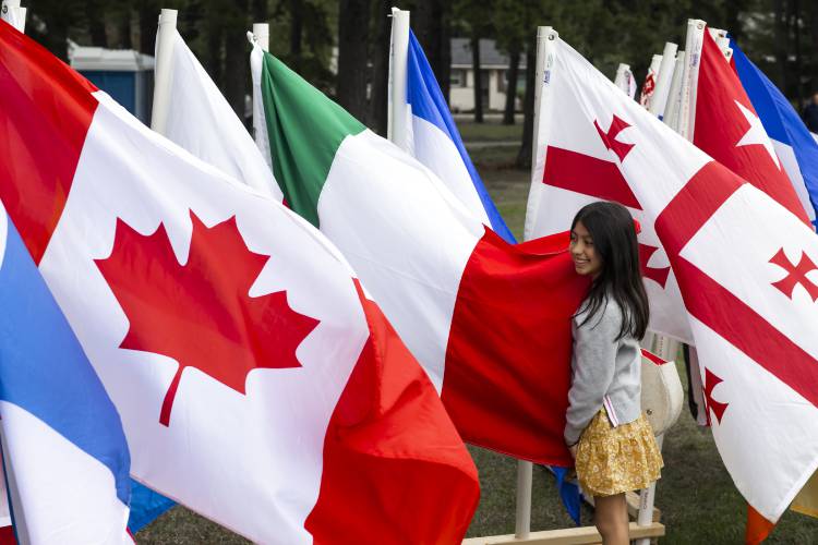 Isla Garcia, 9, searches for the Italian flag at the 2023 Multicultural Festival on Sunday, Sept. 23, 2023. Her mother was born and raised in Italy.