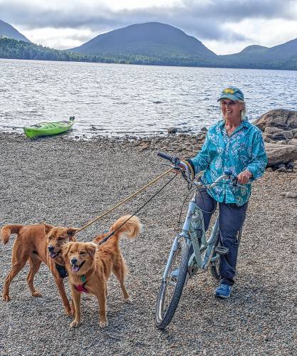 Joy (left) and Flora wait patiently on the shore of Eagle Lake in the Acadia National Park in Maine. It turns out that Flora was a bit of a celebrity in Nova Scotia. Joy (left) and Flora wait patiently on the shore of Eagle Lake in the Acadia National Park in Maine. It turns out that Flora was a bit of a celebrity in Nova Scotia.