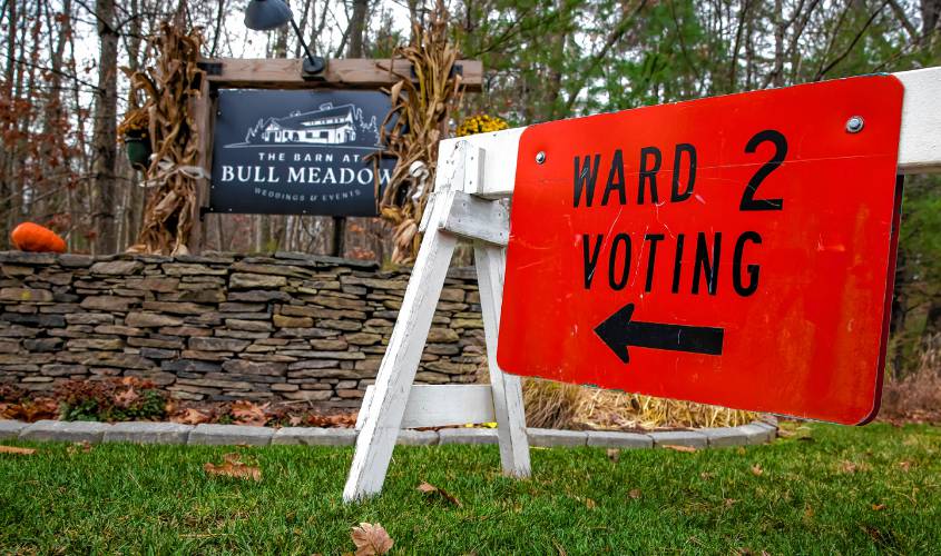 The Ward Two sign outside The Barn at Bull Meadow on Bog Road as the crews prepare for the polling location.