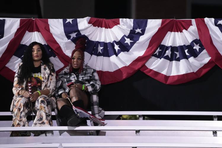 Supporters sit in the bleachers as people leave an election night campaign watch party for Democratic presidential nominee Vice President Kamala Harris after it was announced that she would not speak on Wednesday, Nov. 6, 2024, on the campus of Howard University in Washington. (AP Photo/Mark Schiefelbein)