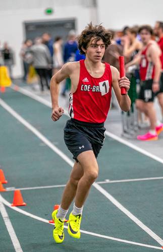 Coe-Brown’s Blake Spina runs a leg of the 4x800-meter relay at last season’s NHIAA Division II indoor track and field championships on Feb. 11 at Plymouth State University. The Bears finished fourth in 4x800 to earn points towards their overall team title. The Coe-Brown boys have won the last two D-II team titles, but Spina is of the few state meet competitors returning this season.