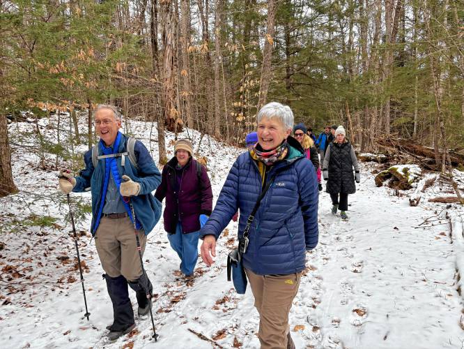 The Concord Trails Subcommittee hosts free group hikes once a month. On Jan. 18, over 30 people hiked together at the Boscawen Town Forest. Jeff Morin (left) Julia Freeman-Woolpert (middle), and Mary Benkert (right) finished the hike  with big  smiles on their faces.