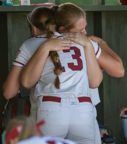 Maggie Taylor (13) hugs Maddy Wachter after Concord’s softball season came to an unexpected end last May in the first round of the Division I playoffs. The Tide will have to make do without Wachter, last year’s Division I Pitcher of the Year, who graduated.