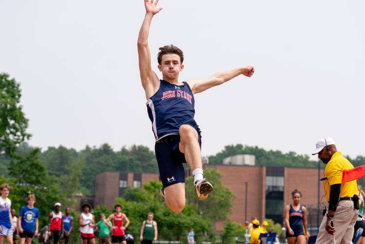 John Stark’s Rio Calle competes in the long jump at the Meet of Champions on Sunday at Oyster River High School. Calle leapt 23 feet, 7.25 inches to set a new state record. 