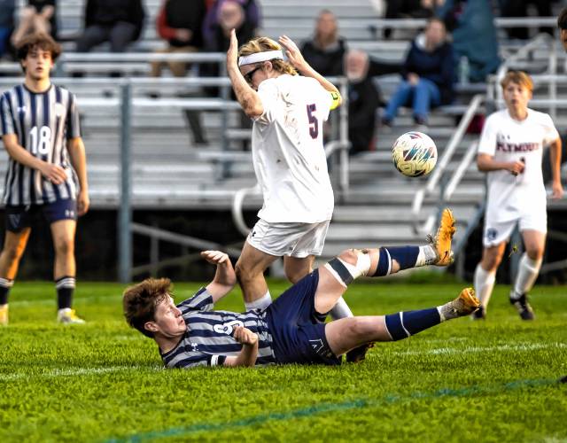 Merrimack Valley defenseman Owen Piper falls down as Plymouth midfielder Dylan Webster tries to avoid him during the second half on Tuesday, October 24, 2023.