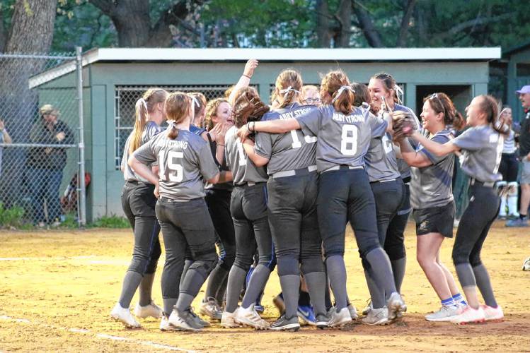 The Franklin softball team celebrates freshman Lily Cornell's 500th career strikeout during the team’s Strikeout Cancer nighton Thursday to raise money for Cornell’s mother, Abby, who is battling brain cancer.