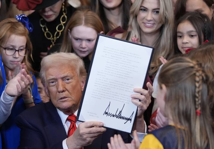President Donald Trump signs an executive order barring transgender female athletes from competing in women's or girls' sporting events, in the East Room of the White House, Wednesday, Feb. 5, 2025, in Washington. (AP Photo/Alex Brandon) President Donald Trump signs an executive order barring transgender female athletes from competing in women's or girls' sporting events, in the East Room of the White House, Wednesday, Feb. 5, 2025, in Washington. (AP Photo/Alex Brandon)