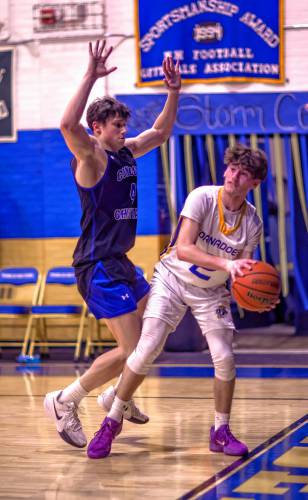 Franklin guard Nathan Holmes (right) tries to maneuver around Concord Christian forward Isaac Kirby during the second half on Tuesday night. Concord Christian defeated Franklin, 64-50.