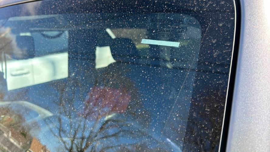 Dirt and dust originating 2,000 miles away in the desert Southwest, is seen on the windshield of a car in Portland, Maine, after being carried by wind and mixing with rain, Saturday, April 19, 2025. (Mike Hartford/WGME-TV via AP)