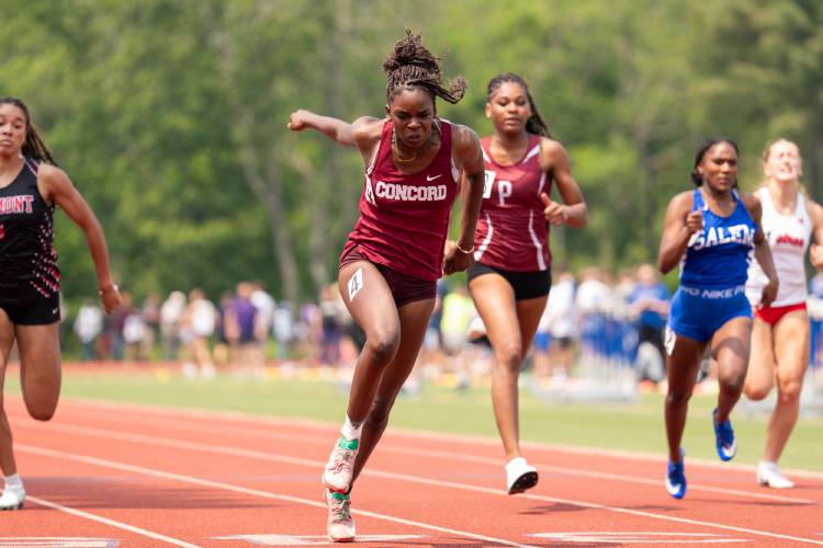 Concord’s Grace Saysaw (center) crosses the finish line to win the 100-meter dash finals at the Meet of Champions on Sunday at Oyster River High School. Saysaw also won the 200, 4x100 and 4x400.