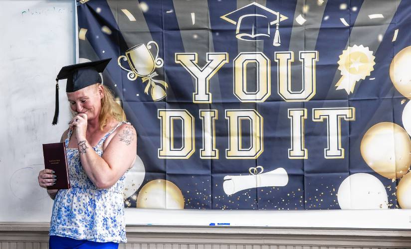 LEFT: Sara Hodgdon pauses while thanking her family at the Second Start adult graduation celebration on Thursday evening. Hodgdon, a mother of six, told of her trials and tribulations of finally getting her diploma.