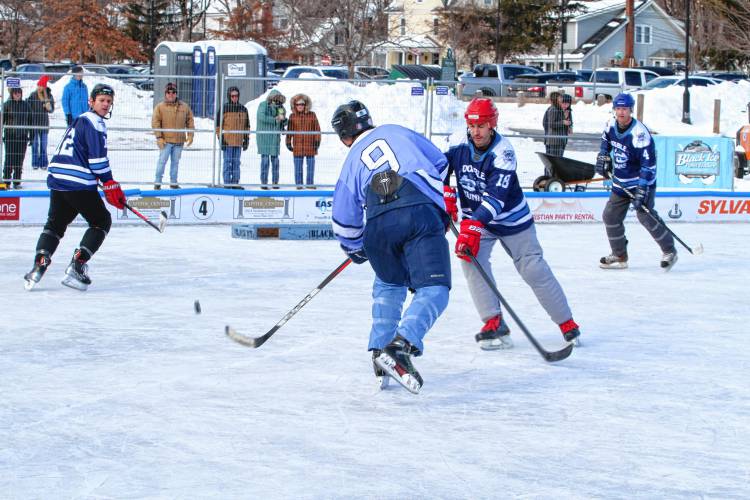 The Double Runnahs (dark blue) and Against Medical Advice faced off on rink four in the early afternoon at White Park.