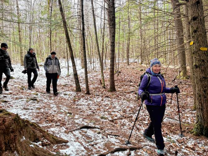 The Concord Trails Subcommittee hosts free group hikes once a month. On Saturday, Jan. 18, 2025, over 30 people hiked together at the Boscawen Town Forest. Wendy Olson (purple) was one of the hike leaders.