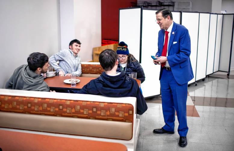 Dr. Patrick Tompkins, president of NHTI-Concord, talks with students in the cafeteria at the campus on Friday, February 9. Tompkins has been at the institution for a full year after coming from Virginia in 2023.