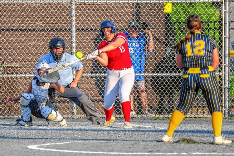 Coe-Brown's Jayden Porter swings at a pitch from Bow's Taylor Ouellette during the D-II softball semifinal at Plymouth State on Tuesday, June 4, 2024.