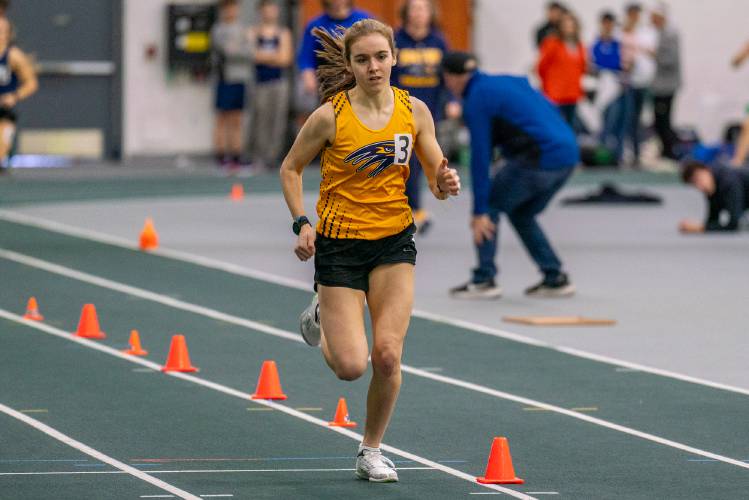 Bow’s Hannah Pawlowski races towards the finish line to claim the 600 meter title at the NHIAA Division II indoor track & field championships on Feb. 11 at Plymouth State. Pawlowski is back to lead the Falcons.