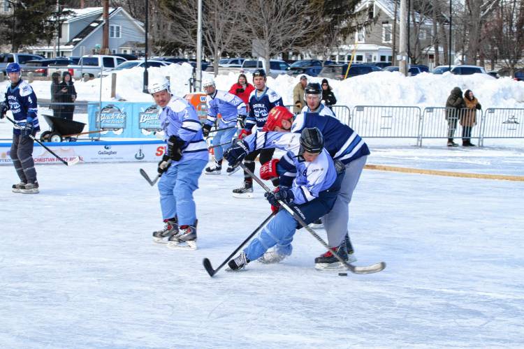The Double Runnahs (dark blue) and Against Medical Advice faced off on rink four in the early afternoon at White Park.