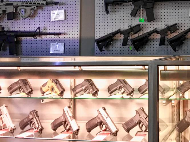 A display case at a New Hampshire gun shop. A display case at a New Hampshire gun shop.