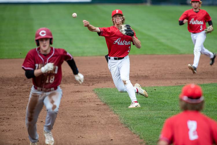 Pinkerton shortstop Brendan Horne (2) throws out Concord’s Dawson Fancher (18) at third base in the Division I baseball semifinal on last June 7 at Nashua’s Holman Stadium. Fancher is one of just three players from last year’s team that is returning to the Concord varsity this spring.