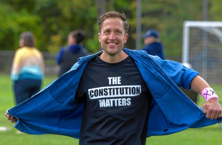 Jason Gerhard shows off his tee shirt at the Bow girls soccer sidelines during their game on Tuesday afternoon, Sept. 24, 2024.