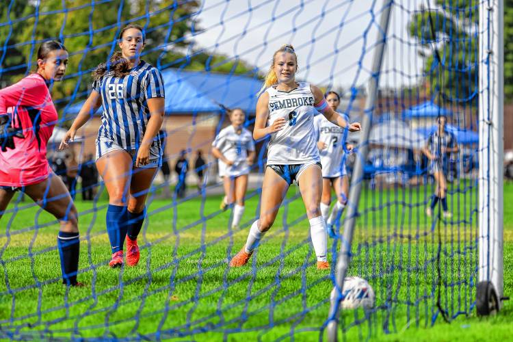 Senior Bailey Gatchell watches as her shot rolls into the back of the net, lifting Pembroke to a 1-0 win over Merrimack Valley.