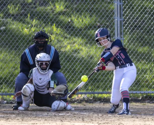ABOVE: John Stark second baseman Avery LaClair drove in runs with this hit against Pembroke on Wednesday. The Generals won a run rule-shortened softball contest, 15-2.
