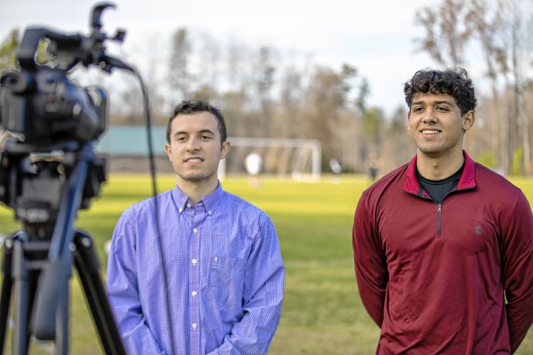 Franklin Pierce University students Rich Rosa (left) and Erik Valdovinos prepare to report from the NCAA D-II national soccer championships in Matthews, NC. The duo was part of a team of students from the University’s Raven Sports Network which broadcast the first Spanish language soccer games for the NCAA.