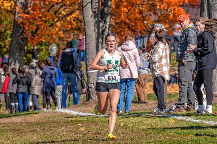 Hopkinton’s Maddy Lane races towards the finish line at Derryfield Park in Manchester at the NHIAA Division III cross country championship on Saturday. Lane defended her individual title, helping Hopkinton win its fourth D-III team championship in five years.