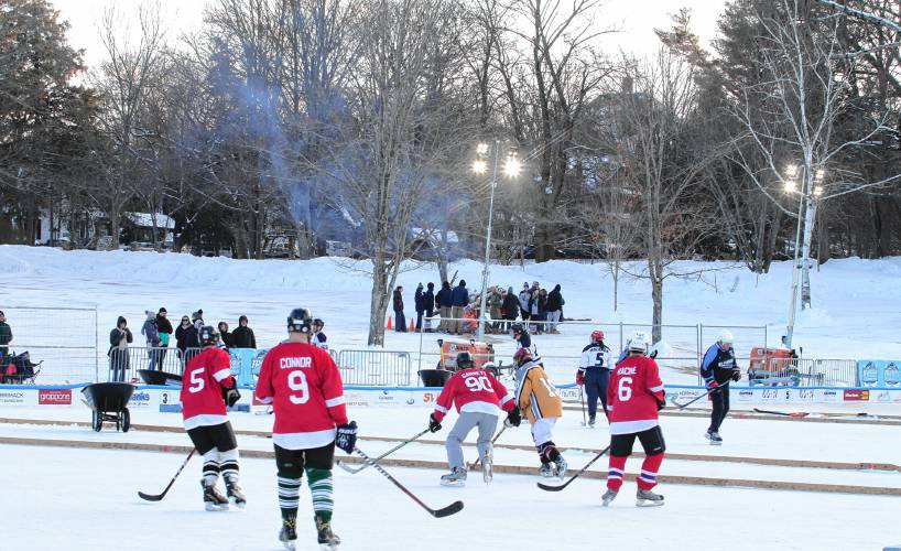 Concord Turnkeys got a shot off against Team Grappone as the sun set on the first day of the pond hockey tournament and a bonfire was lit for spectators to stay warm.