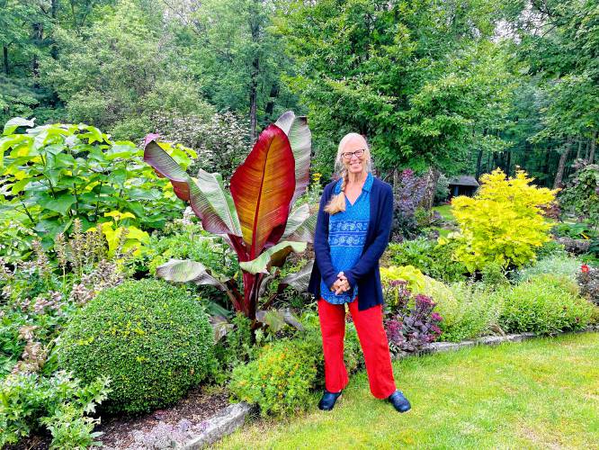 Laura Trowbridge with her banana tree. 