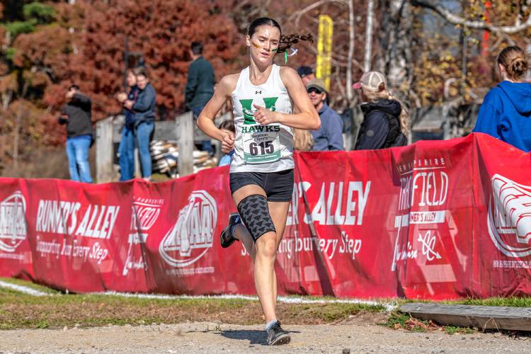 Hopkinton’s Shaylee Murdough races towards the finish line at Derryfield Park in Manchester at the NHIAA Division III cross country championship on Saturday. Murdough finished third, helping lead Hopkinton to its fourth team title in 5 years. 