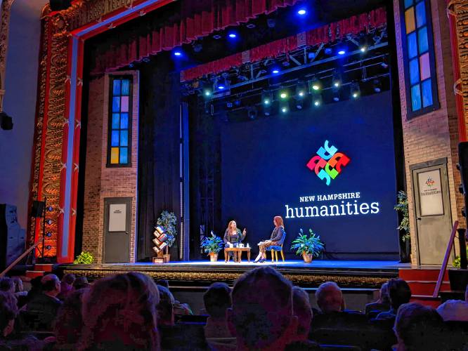 New Hampshire poet laureate Alexandria Peary, right, interviews author Jodi Picoult, left, at the New Hampshire Humanities 2023 Annual Celebration of the Humanities at The Palace Theatre in Manchester on Wednesday.
