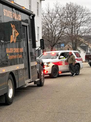 State and local police were investigating a shooting outside Citizens Bank in downtown Pittsfield Saturday afternoon.