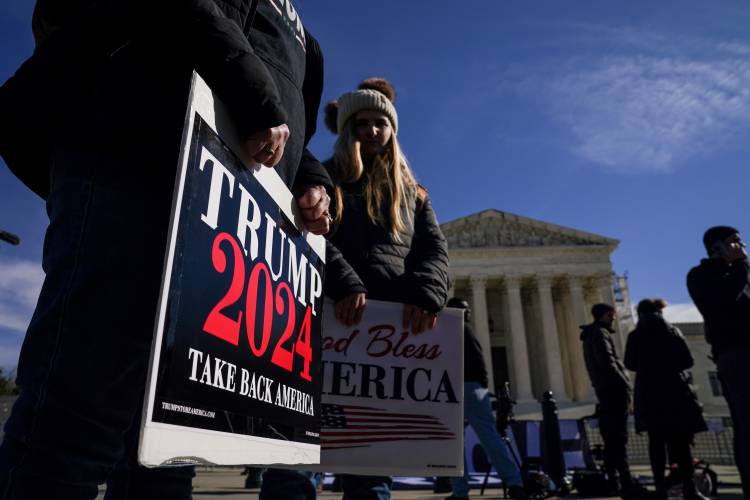 Demonstrators for and against Donald Trump protest outside the United States Supreme Court on February 8, 2024, in Washington, DC.