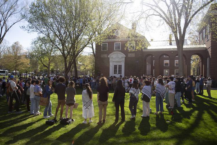 Dozens of students and community members gather for an “Endowment is Political” rally on Dartmouth College’s Baker Lawn on Tuesday. Student organizers announced at the end of the rally that they plan to establish a  “Brave Space” on the Baker Lawn that is in compliance with campus policies that students will occupy from 9 a.m. to 9 p.m. daily. 