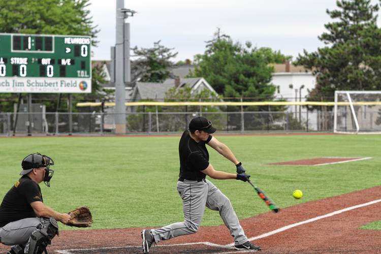 Maine warden Kris MacCabe takes a swing ahead of the fifth-annual North Woods Throwdown against the New Hampshire Conservation Officers at Gill Stadium in Manchester on Saturday, June 29, 2024.